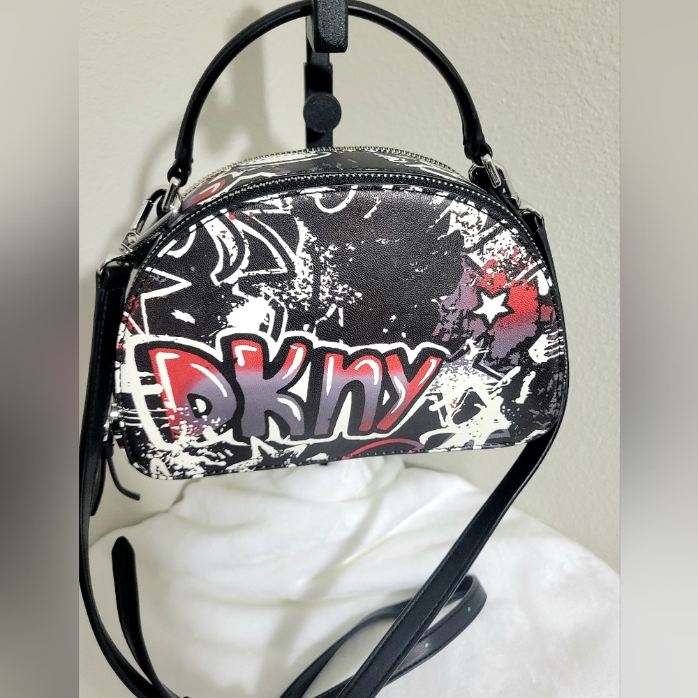 #30. DKNY Double Zipper Graffiti top handle & crossbody strap bag.